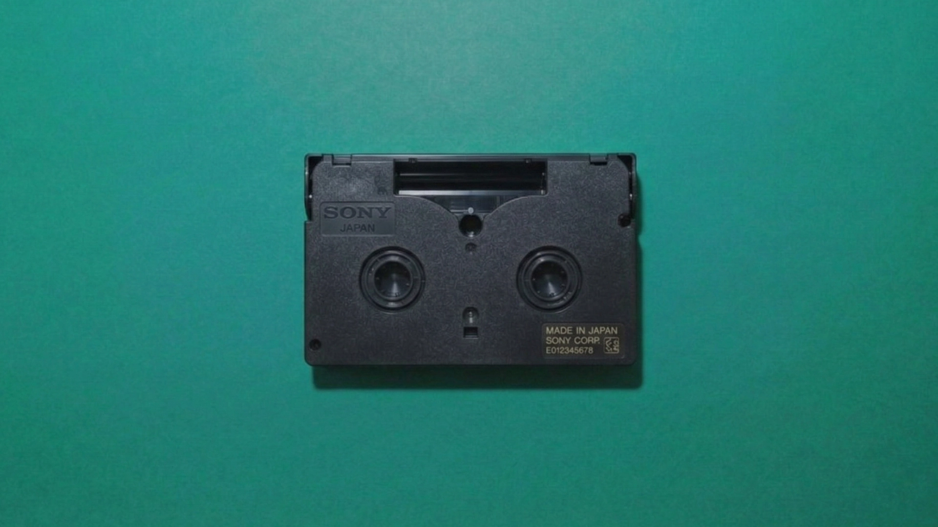 Digital8 cassette back view showing tape mechanism