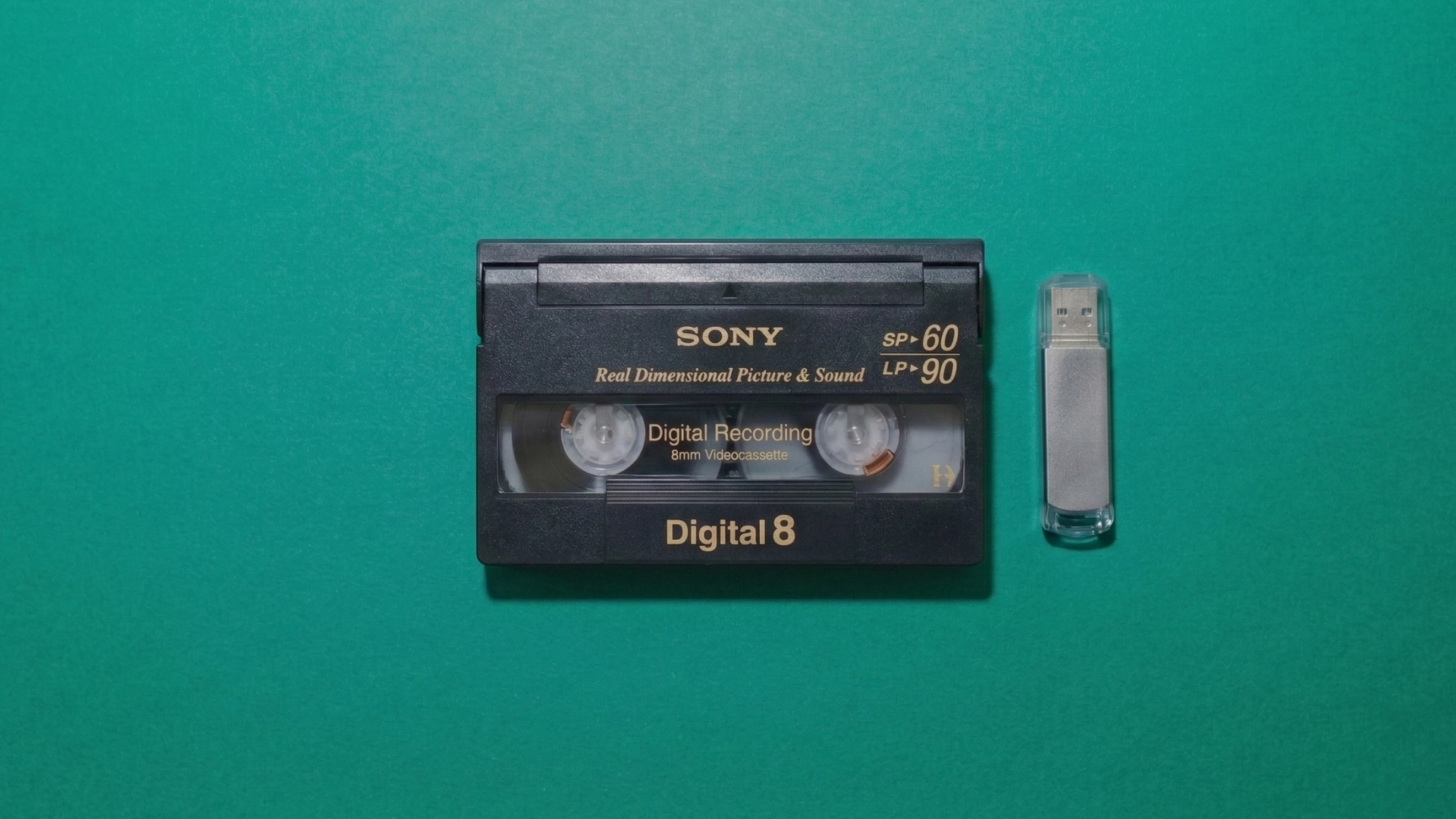 Digital8 cassette with USB drive showing digital transfer