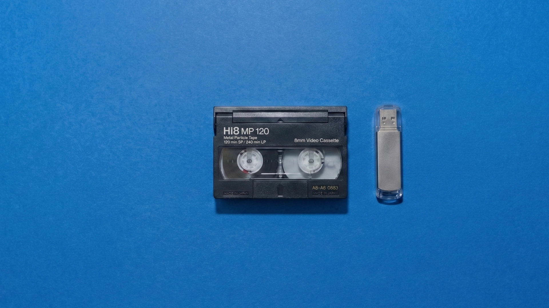 Hi8 cassette with USB drive showing digital transfer